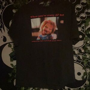 This is an XL unisex shirt with chucky on it.